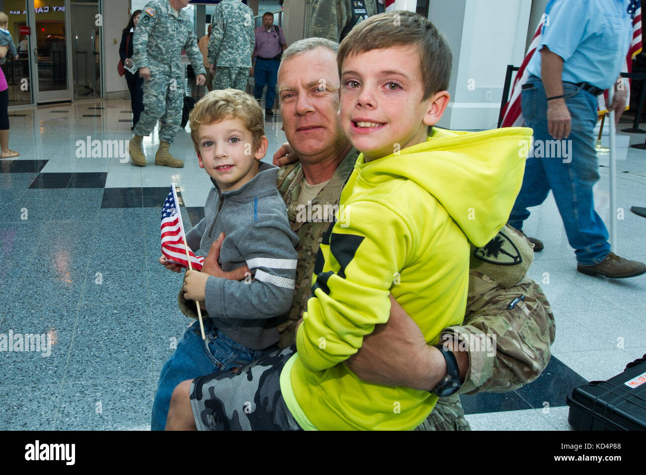 U.S. Army Soldiers, assigned to the South Carolina Army National Guard 132nd Military Police Company, return home to Columbia, S.C., from their deployment to Afghanistan, Oct. 31, 2014.  The 132nd MP Company is the last unit from the South Carolina National Guard to be deployed to a combat zone in Afghanistan. (U.S. Air National Guard photo by Tech. Sgt. Jorge Intriago/Released) Stock Photo