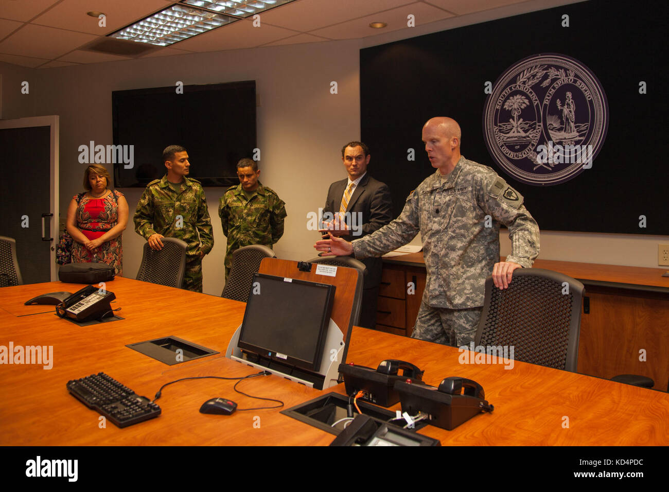 Judge Advocate Generals with the Republic of Colombia armed forces are joined by South Carolina National Guard JAG members in Columbia, S.C., May 18-22, 2015 as part of the National Guard’s state partnership program. The Colombians visited South Carolina’s Supreme Court and state house where they met with state lawmakers and members of the state’s congressional delegation. Their visit also included a tour of the S.C. National Guard’s joint operations center with the S.C. Emergency Management Division.   (U.S. Army National Guard photo by Capt. Brian Hare/Released) Stock Photo