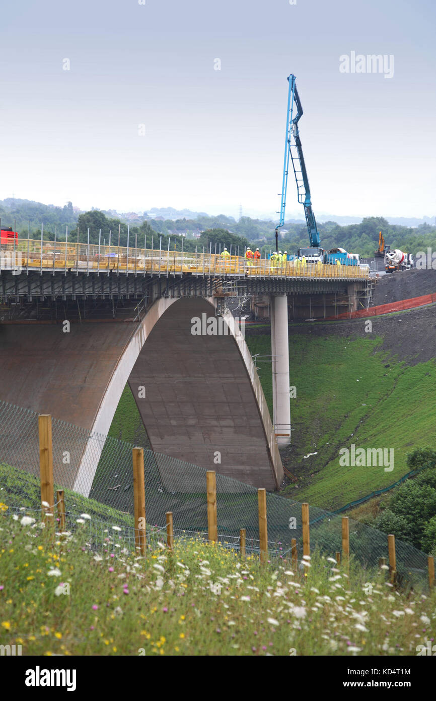 A new, concrete road bridge under construction at Bargoed in South Wales, UK. Part of a Government and EEC funded development initiative. Stock Photo