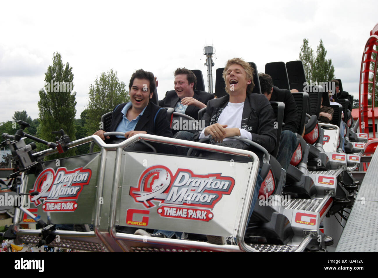 Members of the classical music vocal quartet G Four pictured on the new G Force ride at Drayton Manor Park, Staffordshire. Stock Photo
