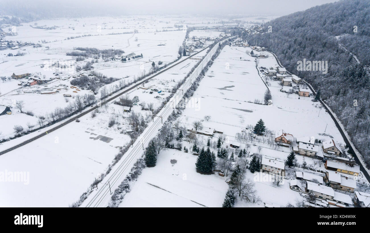Aerial view of snow covered town Stock Photo - Alamy