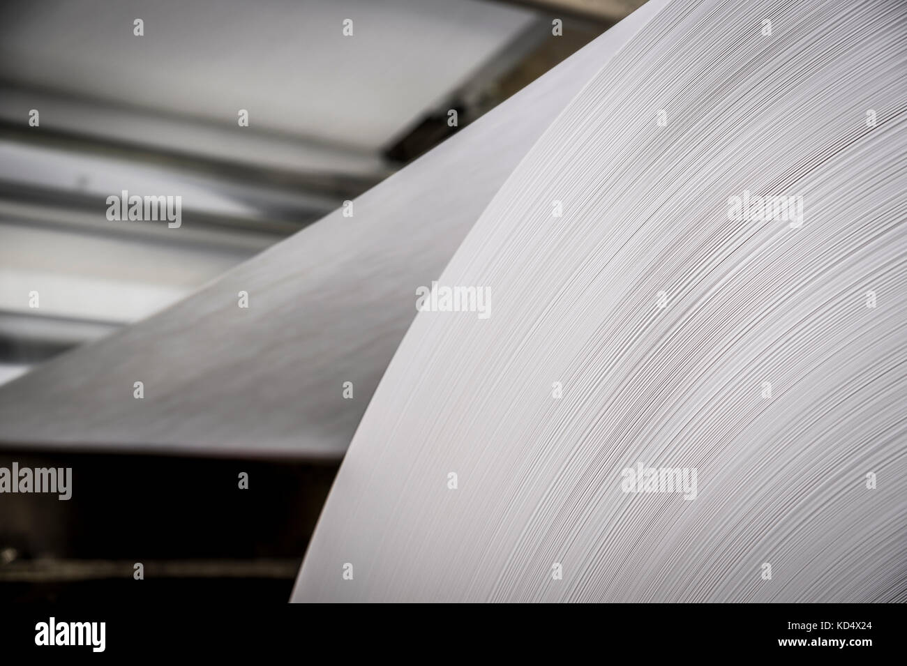 Detail Of Large White Paper Roll On Commercial Printing Press Stock Photo