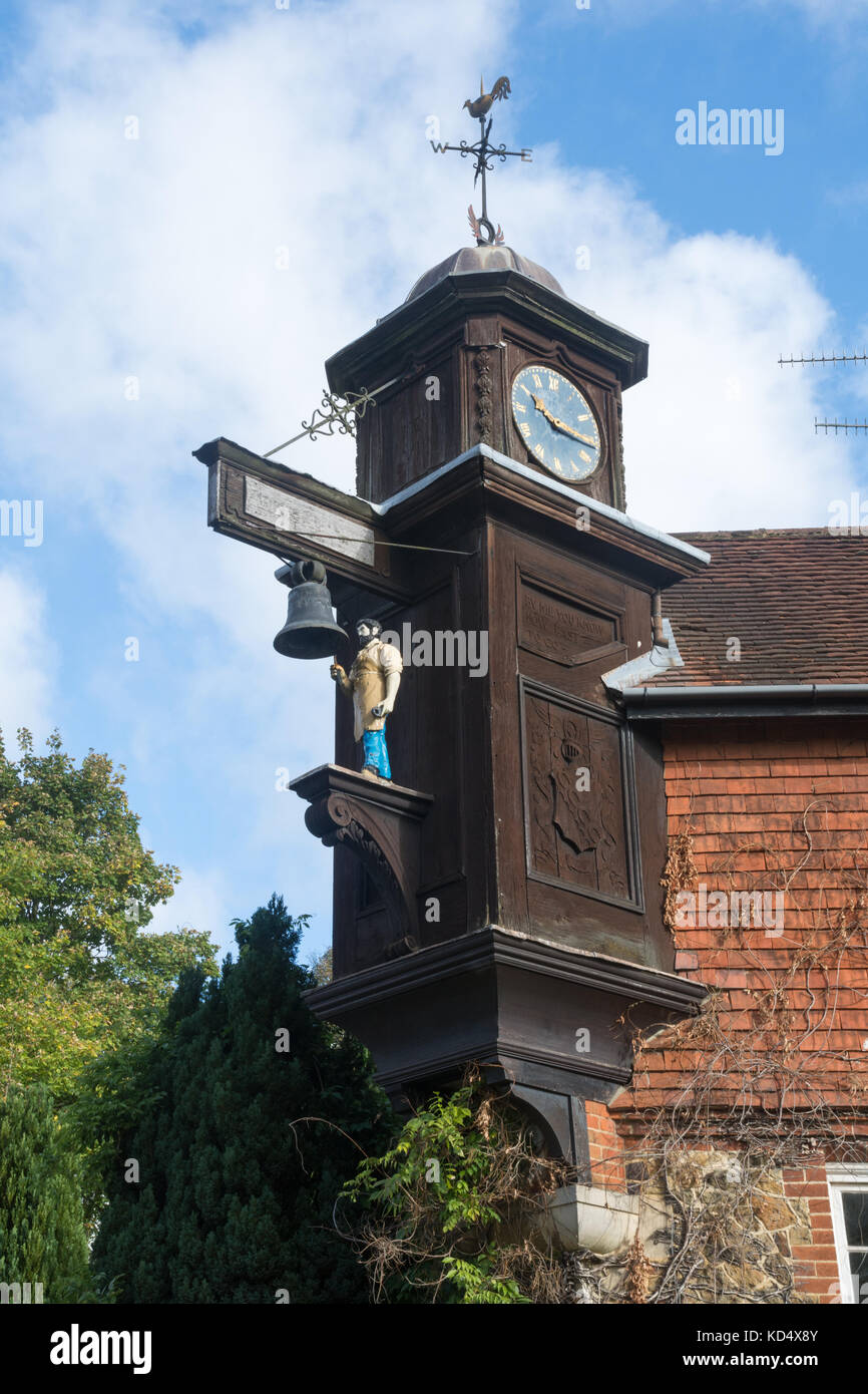 Village clock with Jack the Hammer figure in Abinger Hammer, a village