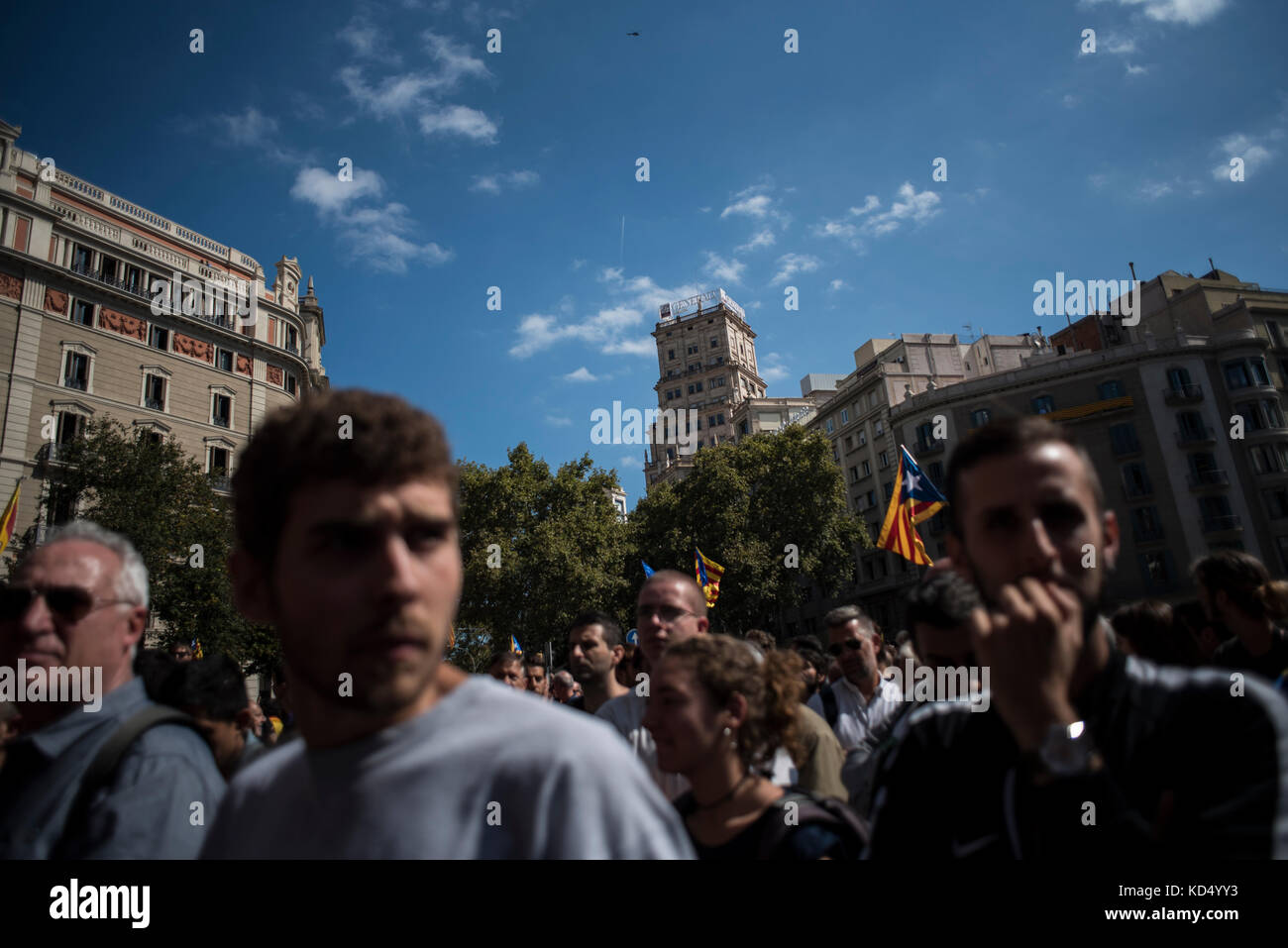 Demonstrators in front of the Conselleria d'Economia in Barcelona, the economy office of the catalan government. Credit: Alamy / Carles Desfilis Stock Photo