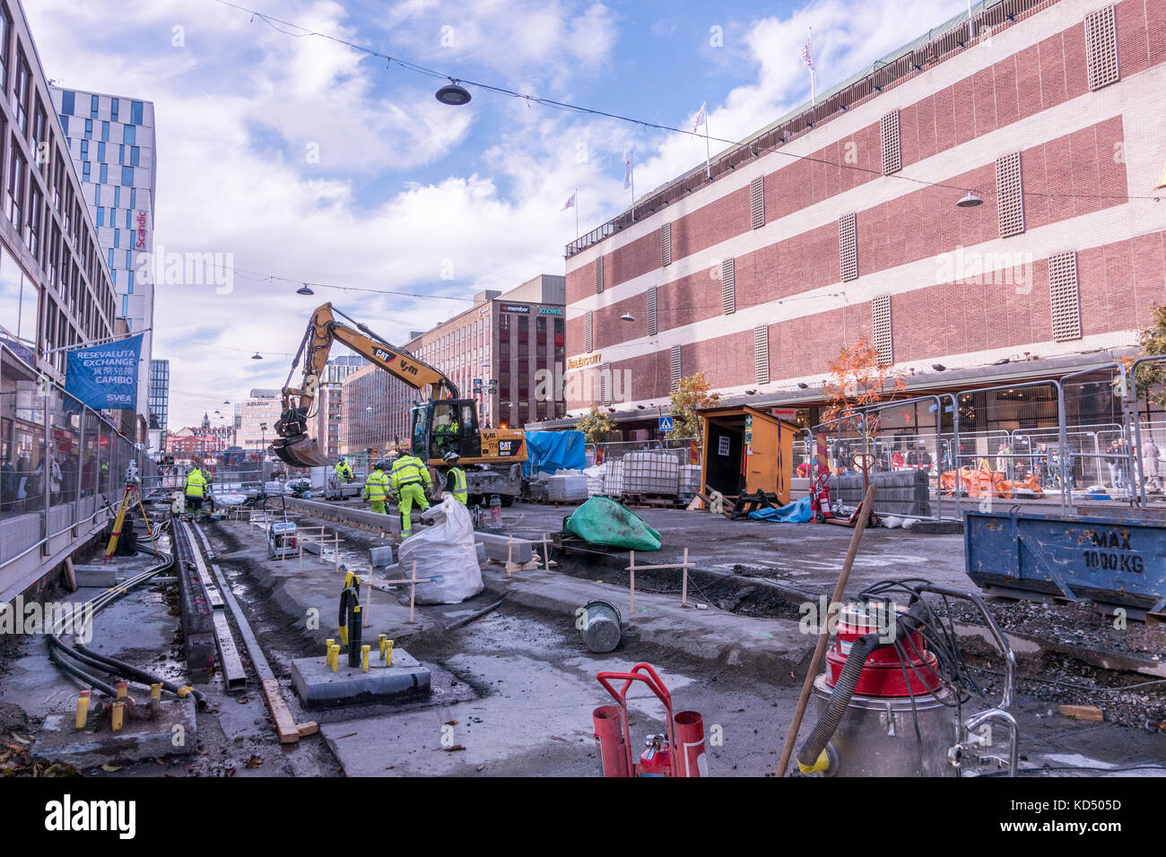 stockholm, Sweden- October 5, 2017: Construction on a central street in stockholm several people working on the site Stock Photo