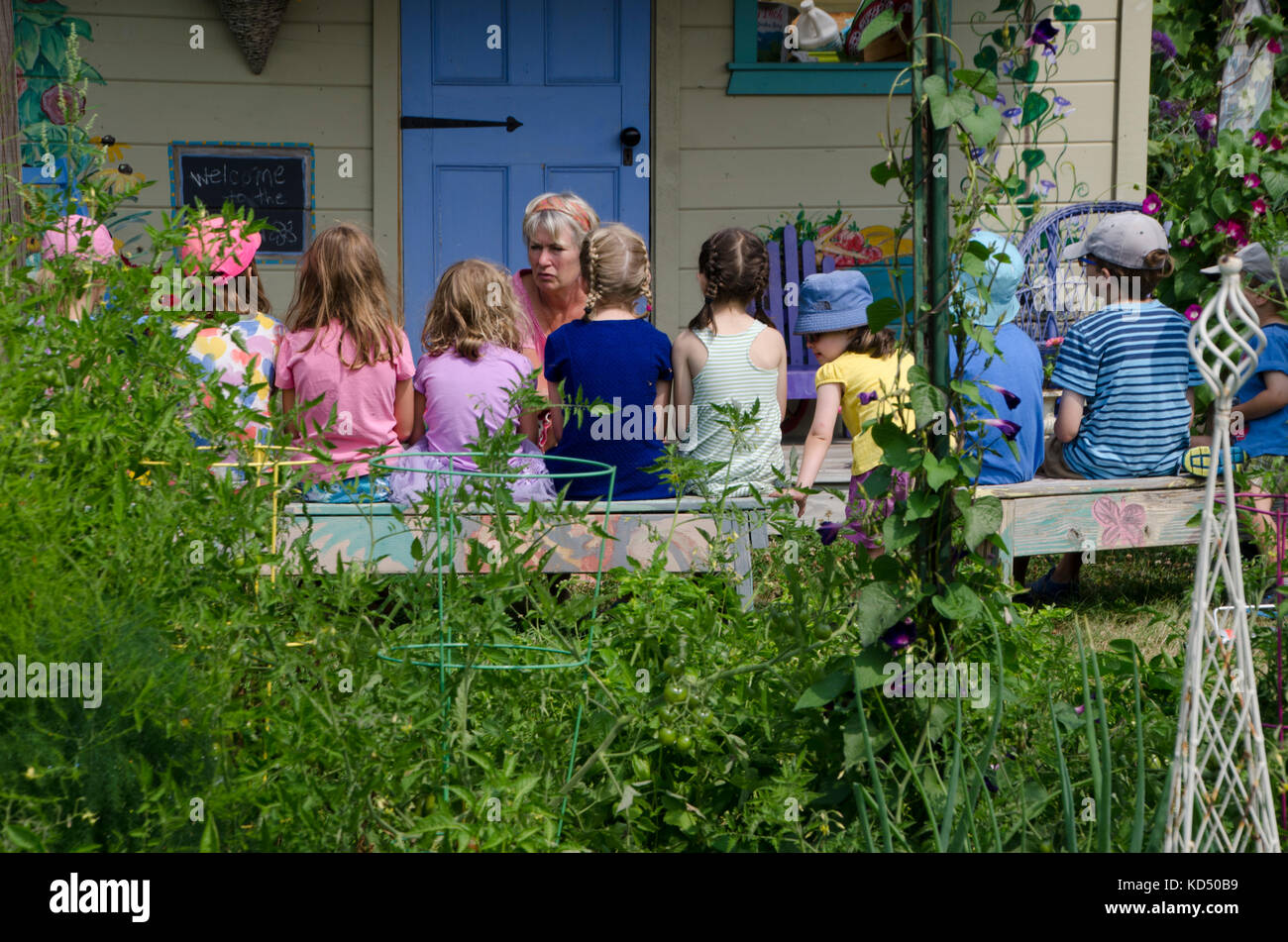 Kids in outdoor classroom with teacher, Maine, USA Stock Photo