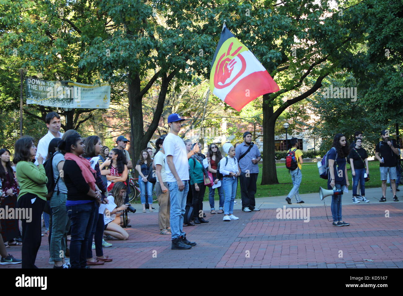 A protest in downtown Ann Arbor about hate, native americans, and Columbus Day Stock Photo