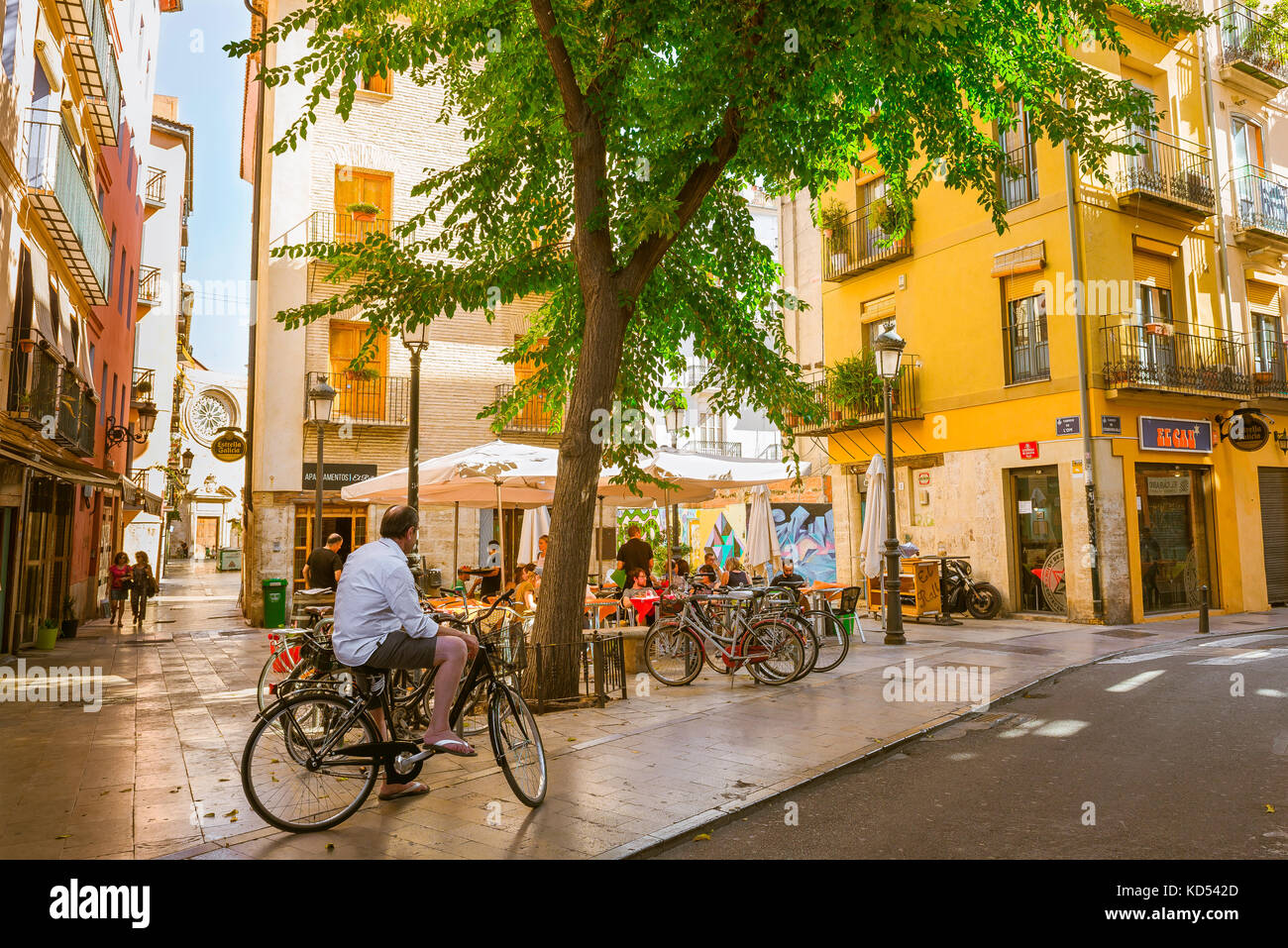 Valencia Spain old town, view of people sitting outside a bar in a small square in the historic old town quarter of Valencia, Spain. Stock Photo
