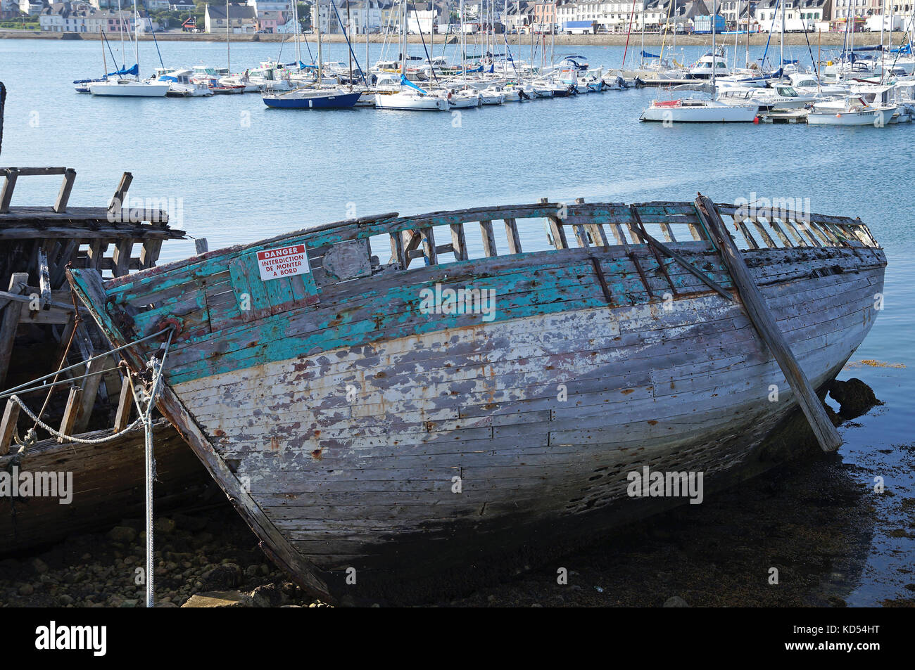 Wreck of old fishing boat stranded on the coast Stock Photo - Alamy
