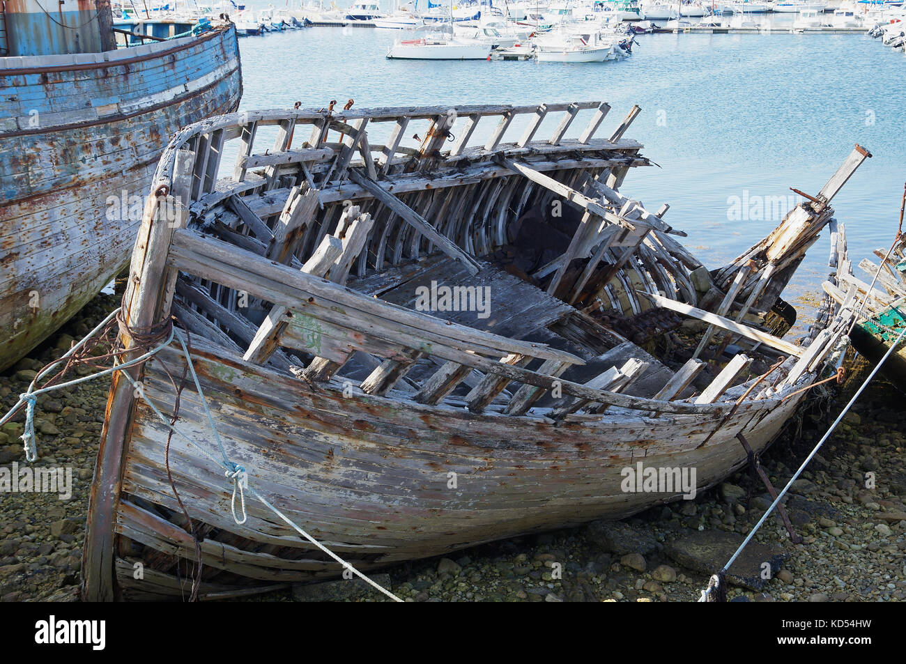 Wreck of old fishing boat stranded on the coast Stock Photo - Alamy