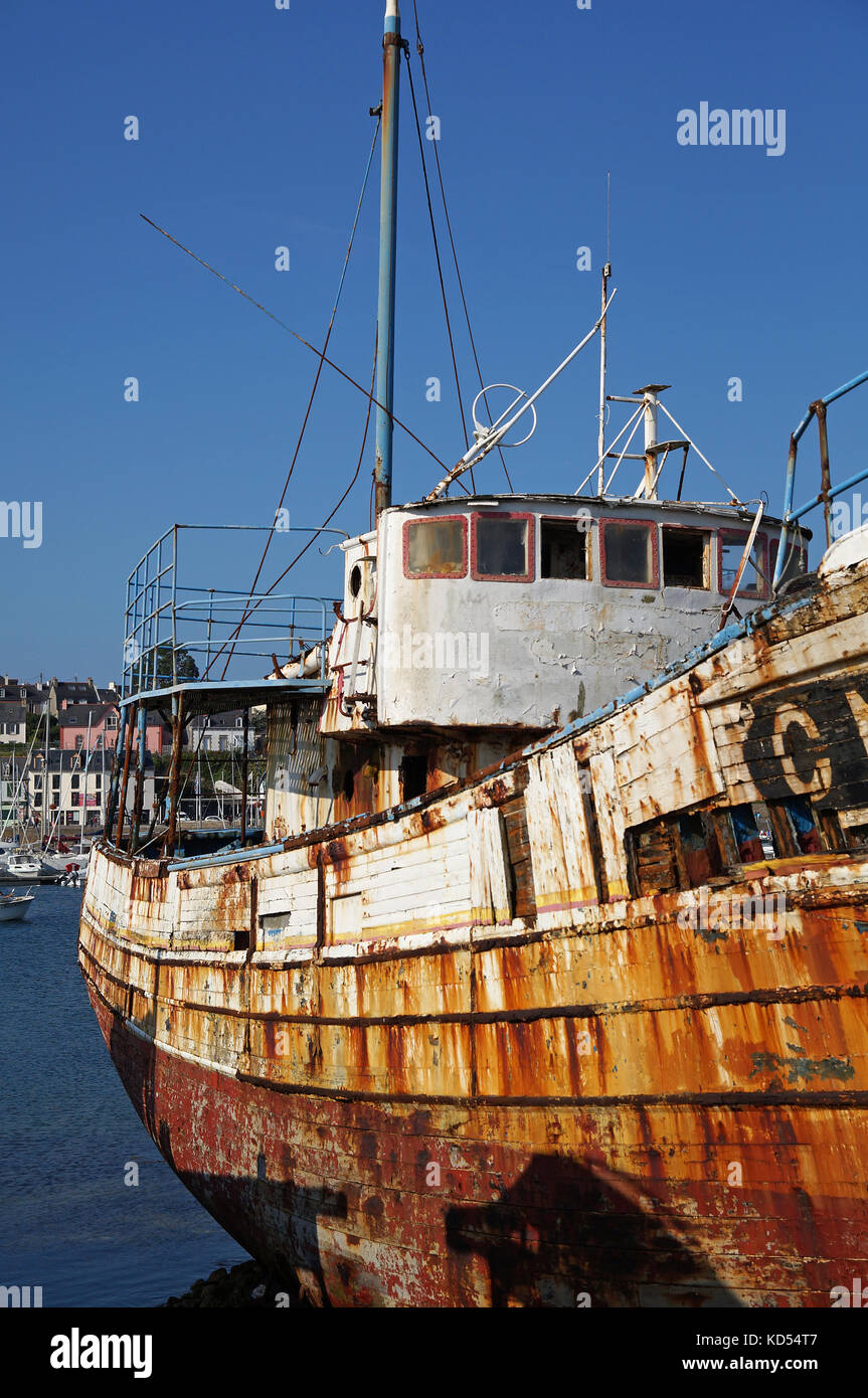 Wreck of old fishing boat stranded on the coast Stock Photo - Alamy