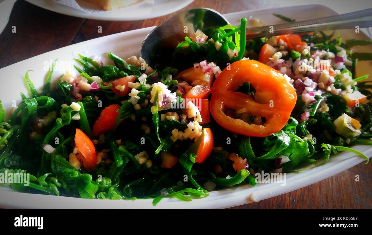 Fiddlehead fern salad or Pako (paco) Salad, a traditional Filipino dish that is rich in fiber, vitamins, antioxidant and pure vegan Stock Photo