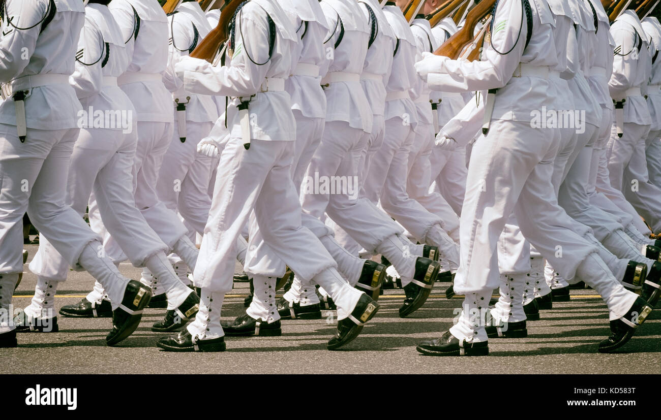 Washington DC close up of marching US Navy platoon in formal white dress uniforms. Memorial Day Parade May 26 2015 Stock Photo