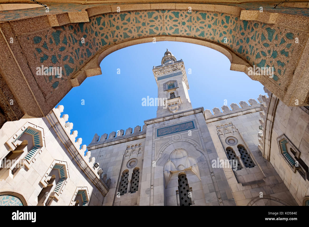 Washington DC Islamic Center mosque, which opened in 1957. View is  looking up from the interior courtyard, at the minaret seen against the blue sky. Stock Photo