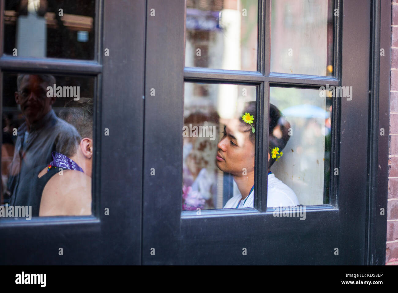 Mail gay couple in the bar on annual LGBT Pride Parade in the city, June 2017 Stock Photo