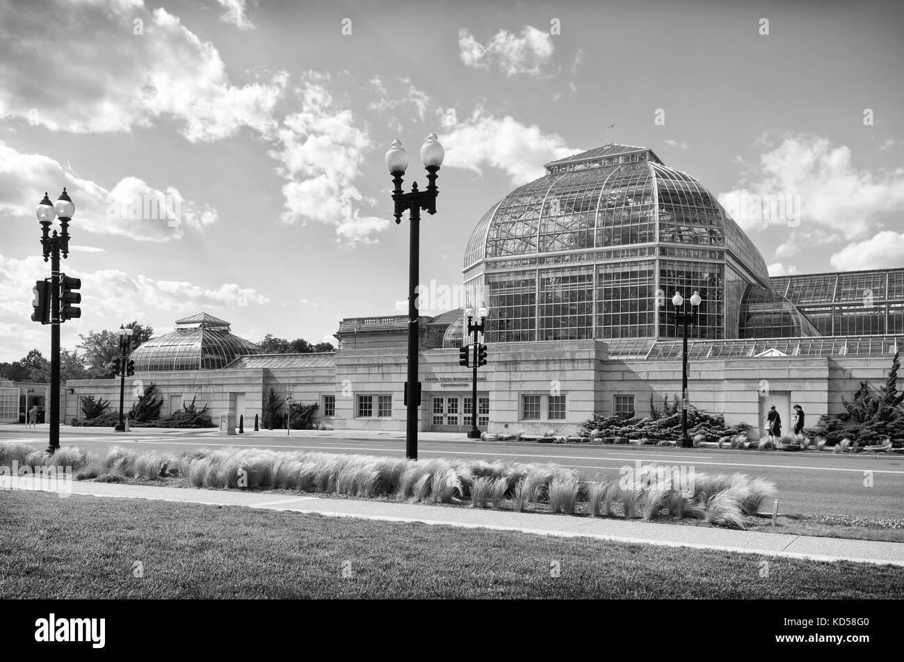 Washington DC Botanic Garden Conservatory in black and white. View of the exterior against dramatic clouds Stock Photo