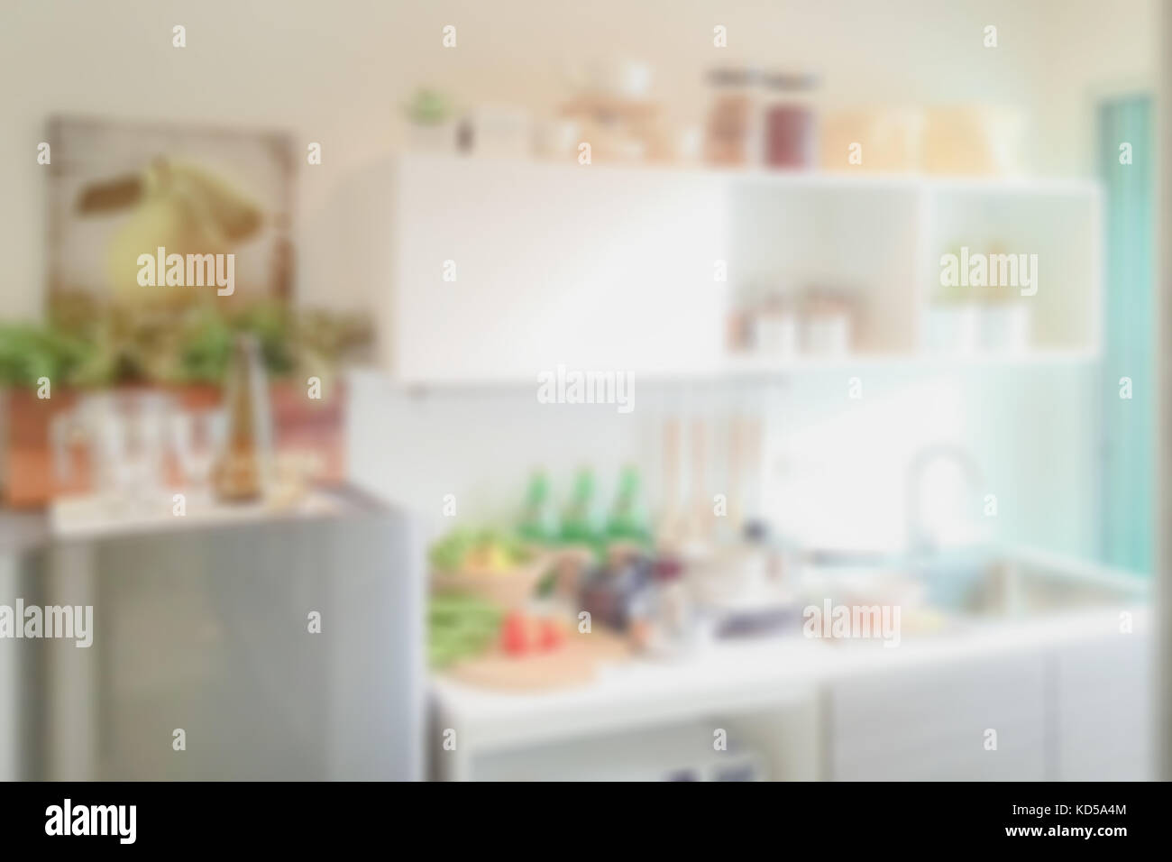 Blurred background of modern kitchen with I shape pantry Stock Photo