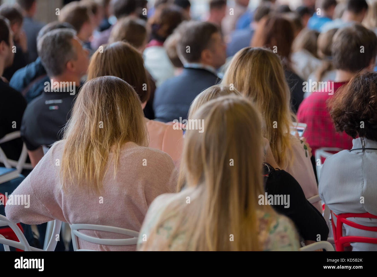 Audience listens to the lecturer Stock Photo - Alamy