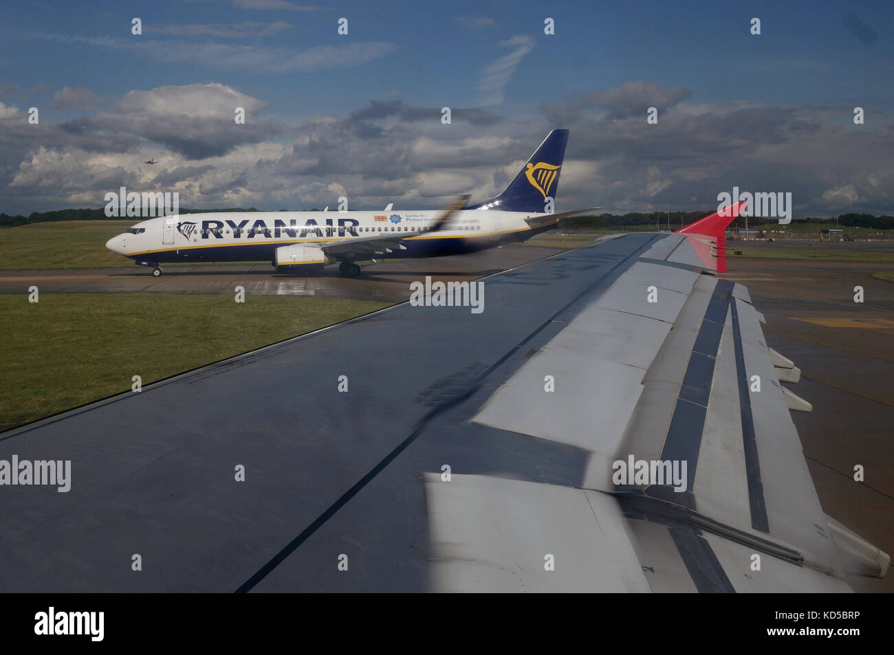 A Ryanair plane on the runway waiting for take off, at London Stansted Airport, in Essex Stock Photo