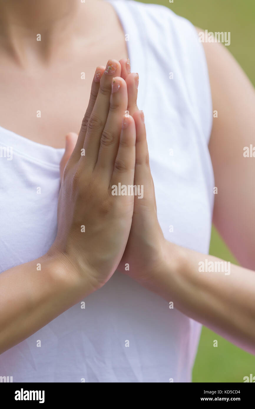 Closeup of beautiful asian women doing yoga in park Stock Photo - Alamy