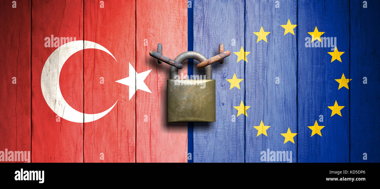 Turkey and EU relations.Turkey and European Union flags on wooden door