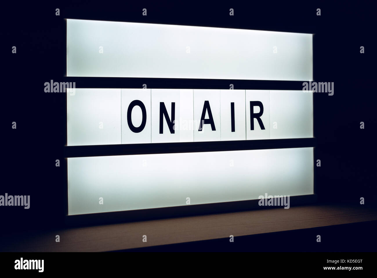 Vintage On Air live broadcast sign in radio or television studio blinking Stock Photo