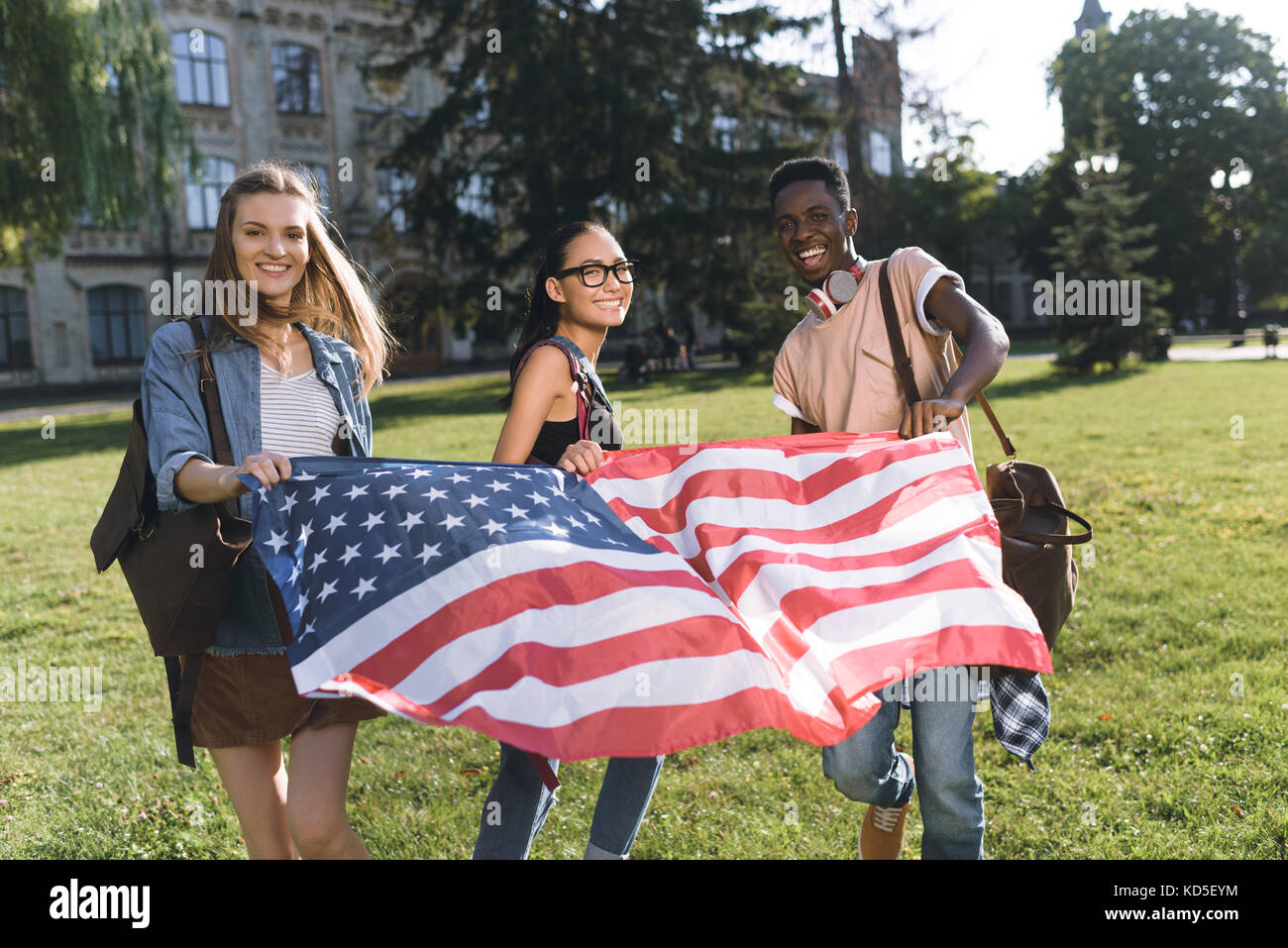 multicultural friends with american flag Stock Photo