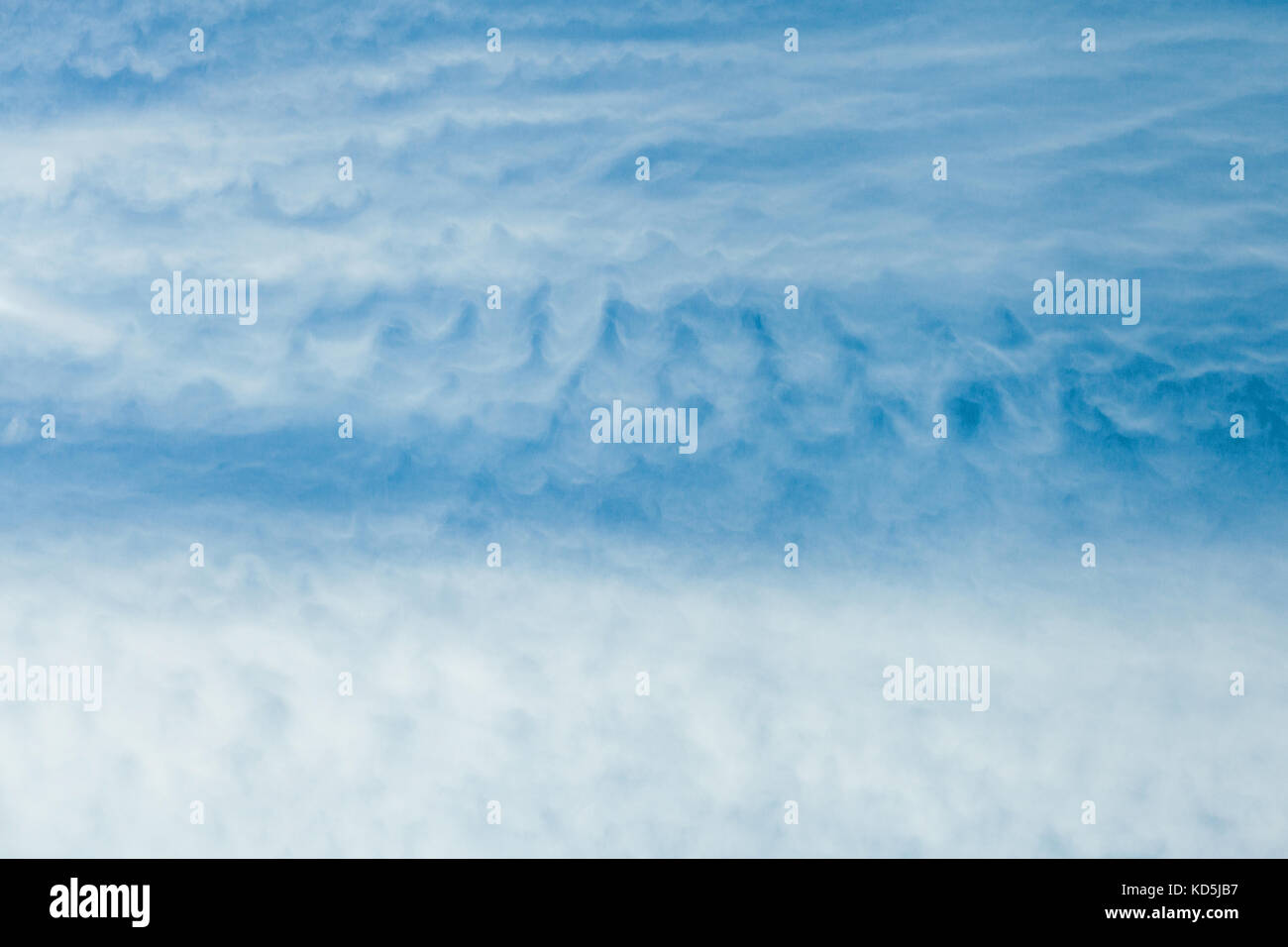 Clouds against the blue sky Stock Photo - Alamy