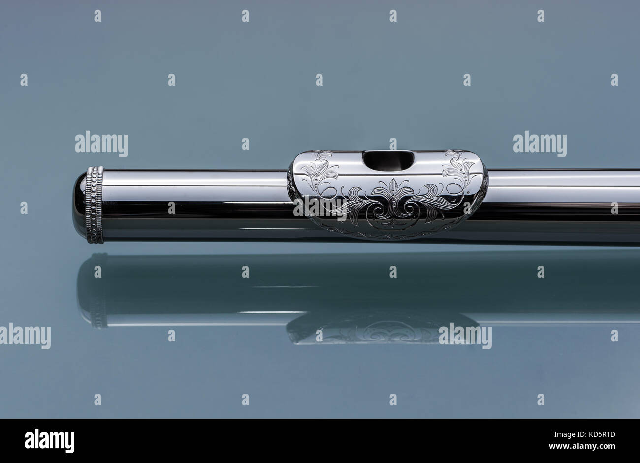 Closeup of the mouthpiece of a platinumplated silver flute Stock