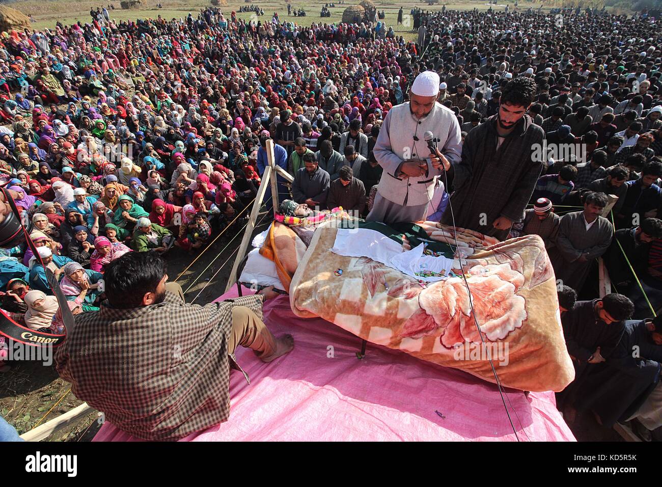 India. 10th October,  2017. People offer funeral to the local militant Irfan Ahmad in Heff area of Shopian some 60 kilometers from Srinagar the summer capital Kashmir. Three militants were killled in an encounter with Indian forces in Gatipora area of south Kashmir's Shopian.Police said Credit: Faisal Khan/Pacific Press/Alamy Live News Stock Photo