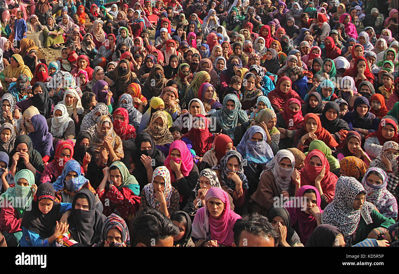 India. 10th October,  2017. Kashmiri women attend the funeral of a local militant Irfan Ahmad in Heff area of Shopian some 60 kilometers from Srinagar the summer capital Kashmir. Three militants were killled in an encounter with Indian forces in Gatipora area of south Kashmir's Shopian.Police said Credit: Faisal Khan/Pacific Press/Alamy Live News Stock Photo