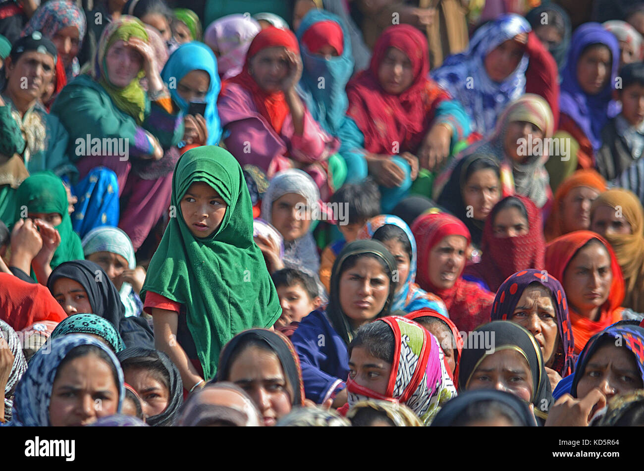 India. 10th October,  2017. A Kashmiri girl attends the funeral of a local militant Irfan Ahmad in Heff area of Shopian some 60 kilometers from Srinagar the summer capital Kashmir. Three militants were killled in an encounter with Indian forces in Gatipora area of south Kashmir's Shopian.Police said Credit: Faisal Khan/Pacific Press/Alamy Live News Stock Photo