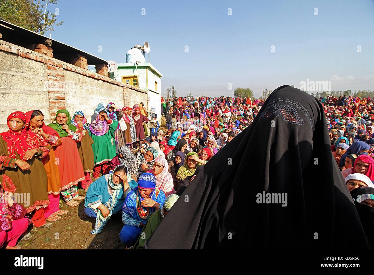 India. 10th October,  2017. Kashmiri women attend the funeral of a local militant Irfan Ahmad in Heff area of Shopian some 60 kilometers from Srinagar the summer capital Kashmir. Three militants were killled in an encounter with Indian forces in Gatipora area of south Kashmir's Shopian.Police said Credit: Faisal Khan/Pacific Press/Alamy Live News Stock Photo