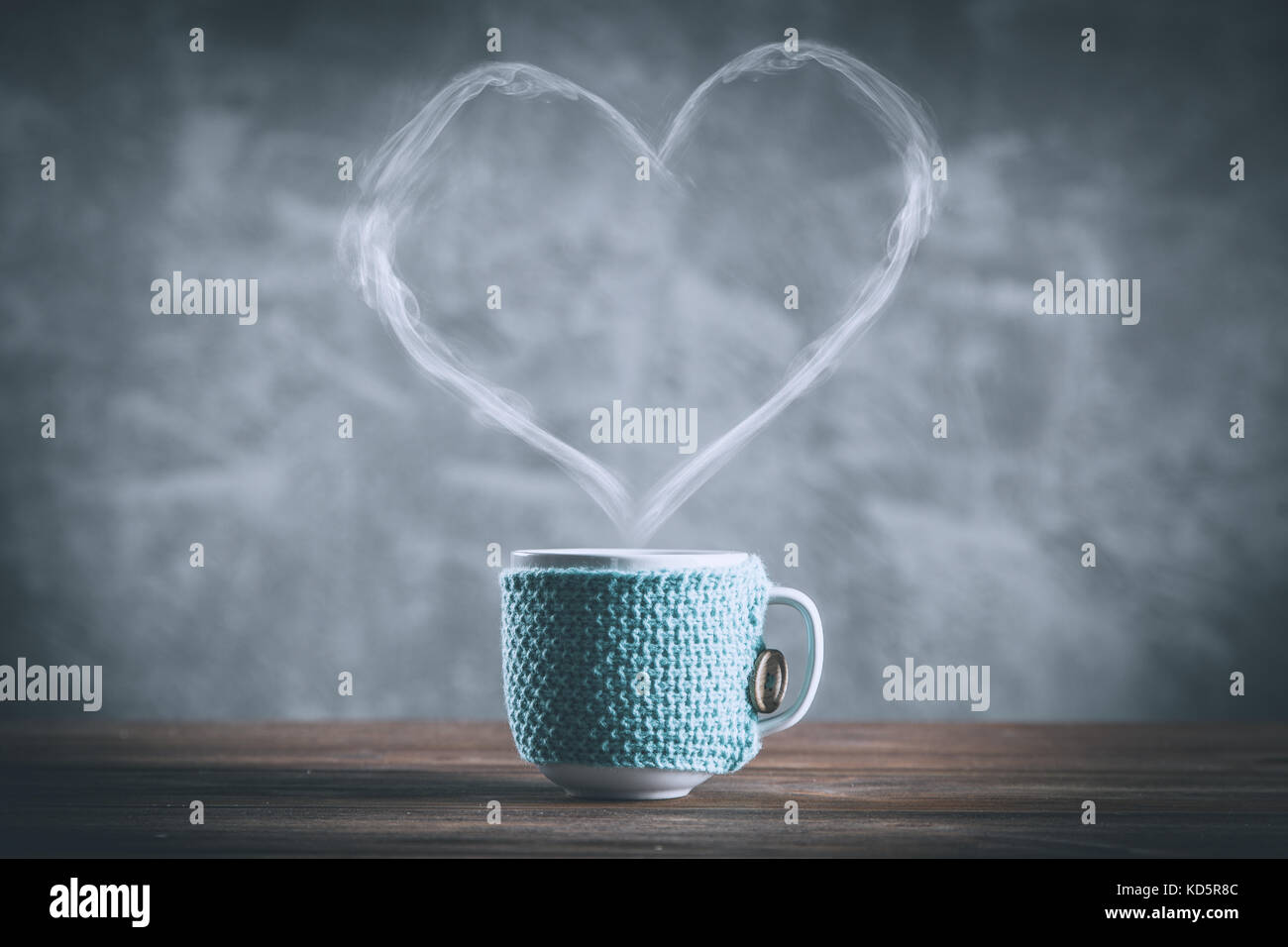 Cup of coffee with a heart shaped steam Stock Photo