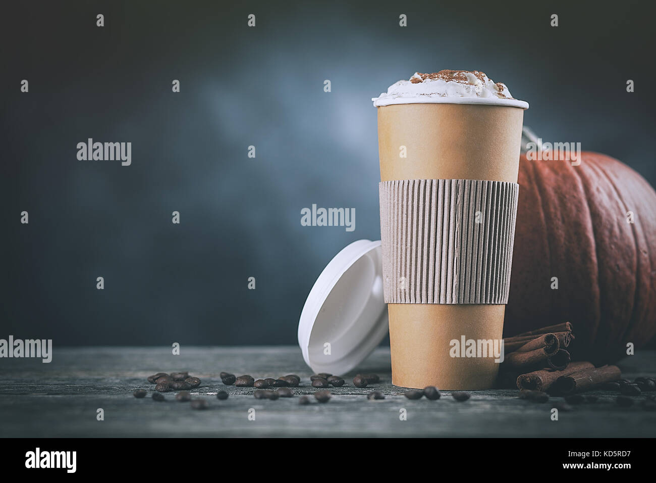 Pumpkin spice latte in a paper cup Stock Photo - Alamy