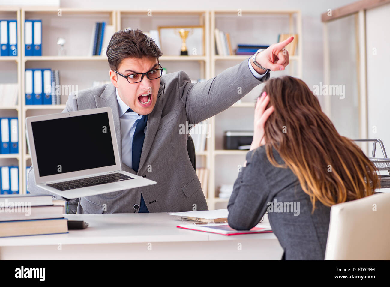 Business meeting between businessman and businesswoman Stock Photo - Alamy