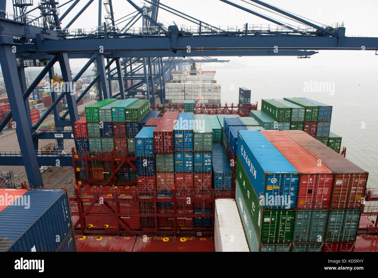Container Onboard Shipping containers in container port and on-board ship Stock Photo - Alamy