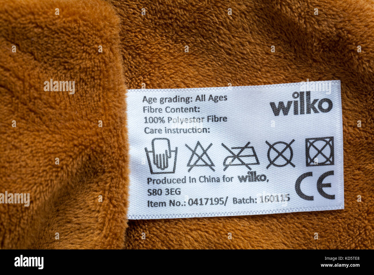 Care washing symbols and instructions on label Wilko comforter produced in China for Wilko 100% polyester fibre CE symbol Stock Photo