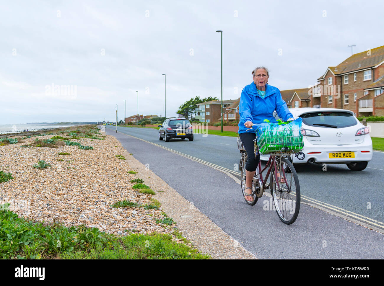 old lady on bike