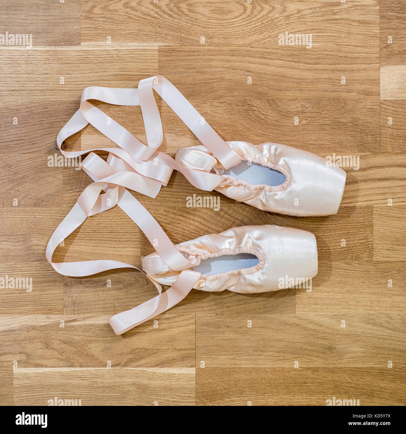 Ballet pointe shoes on wooden floor Stock Photo Alamy