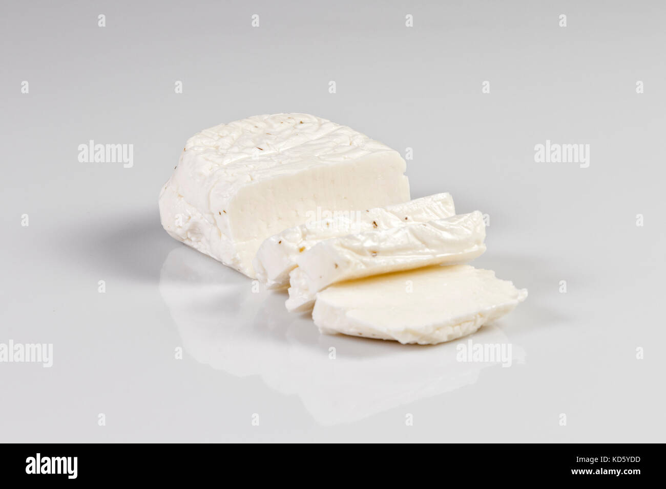 Sliced halloumi cheese with mint isolated on white Stock Photo
