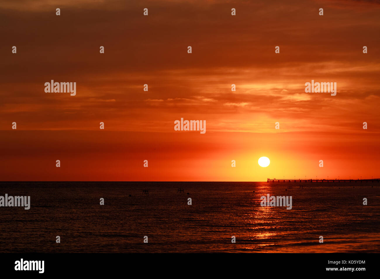 Beautiful sunset above the sea with beautiful color sky Stock Photo - Alamy