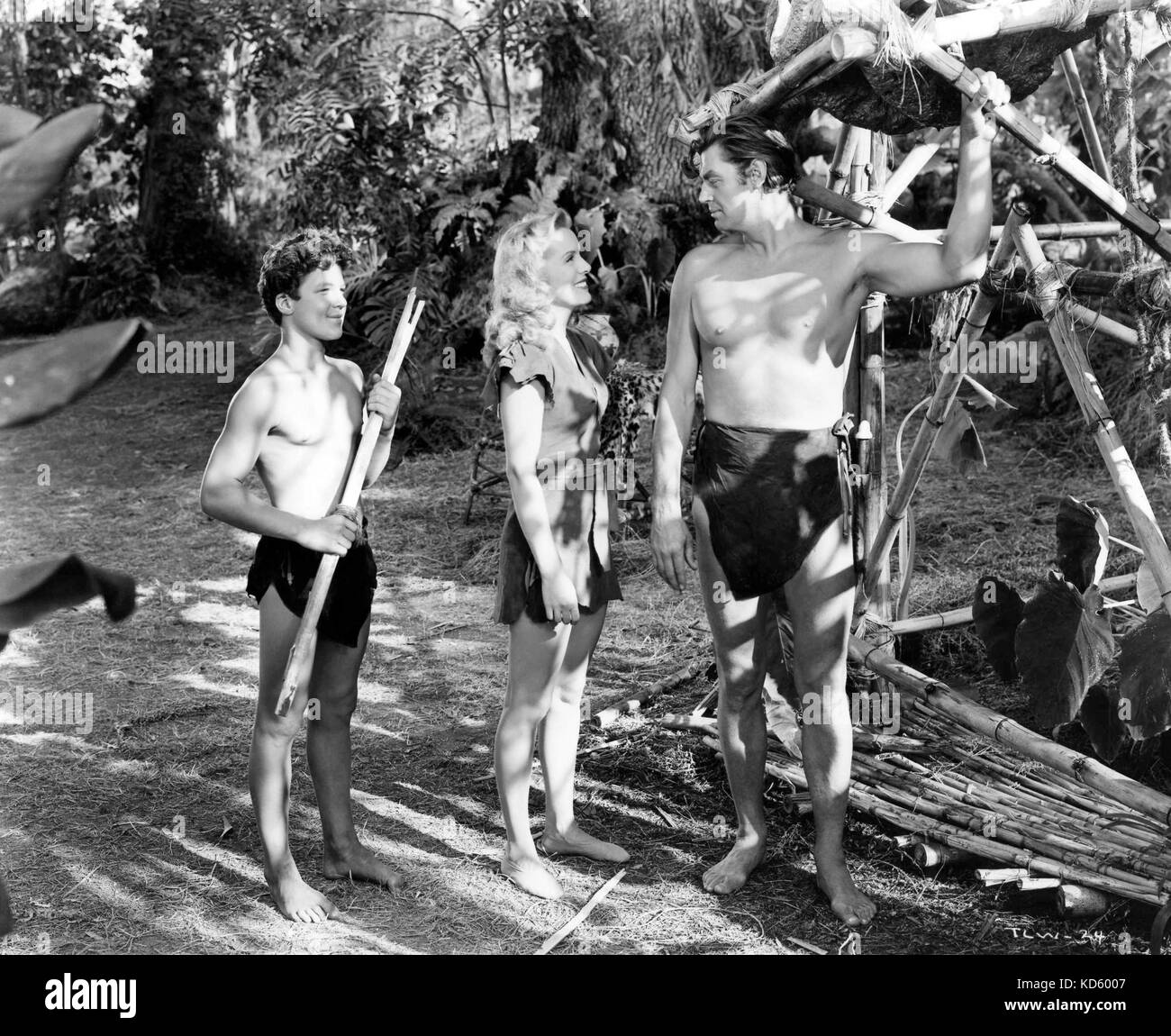 TARZAN AND THE LEOPARD WOMAN 1946 Sol Lesser Productions film with Brenda Joyce, Johnny Weismuller and Johnny Sheffield as Boy Stock Photo