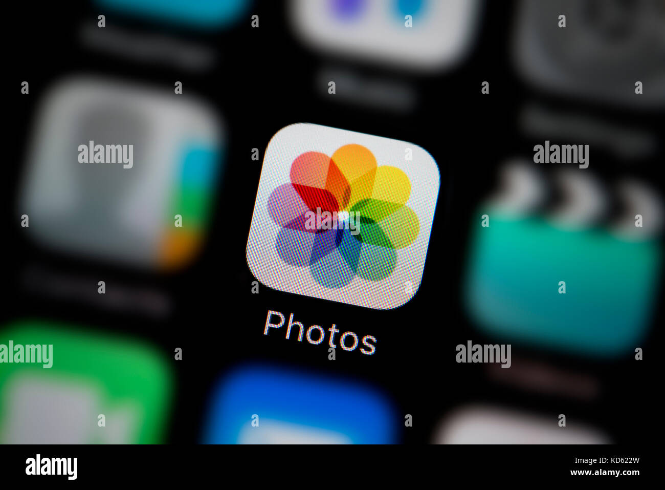 A close-up shot of the Photos app, as seen on the screen of an Apple iPhone (Editorial use only) Stock Photo