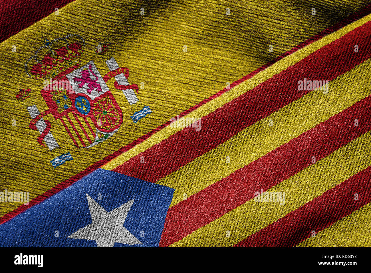 3D rendering of the flags of Spain and Catalonia on woven fabric texture. Detailed textile pattern and grunge theme. Concept of separatist referendum. Stock Photo