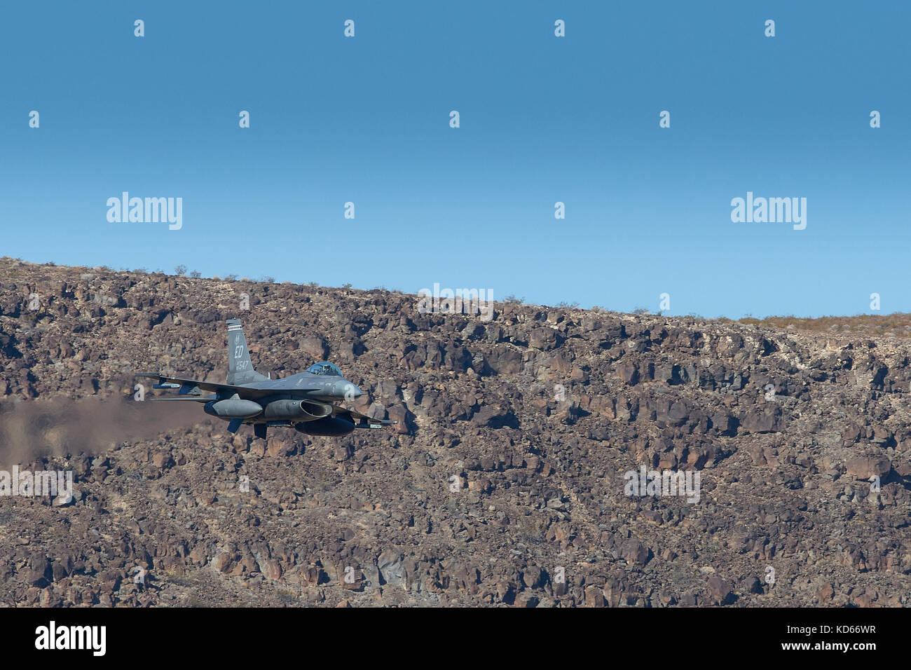 United States Air Force F-16C, Fighting Falcon, Flying At Low Level Through Rainbow Canyon, California. Stock Photo