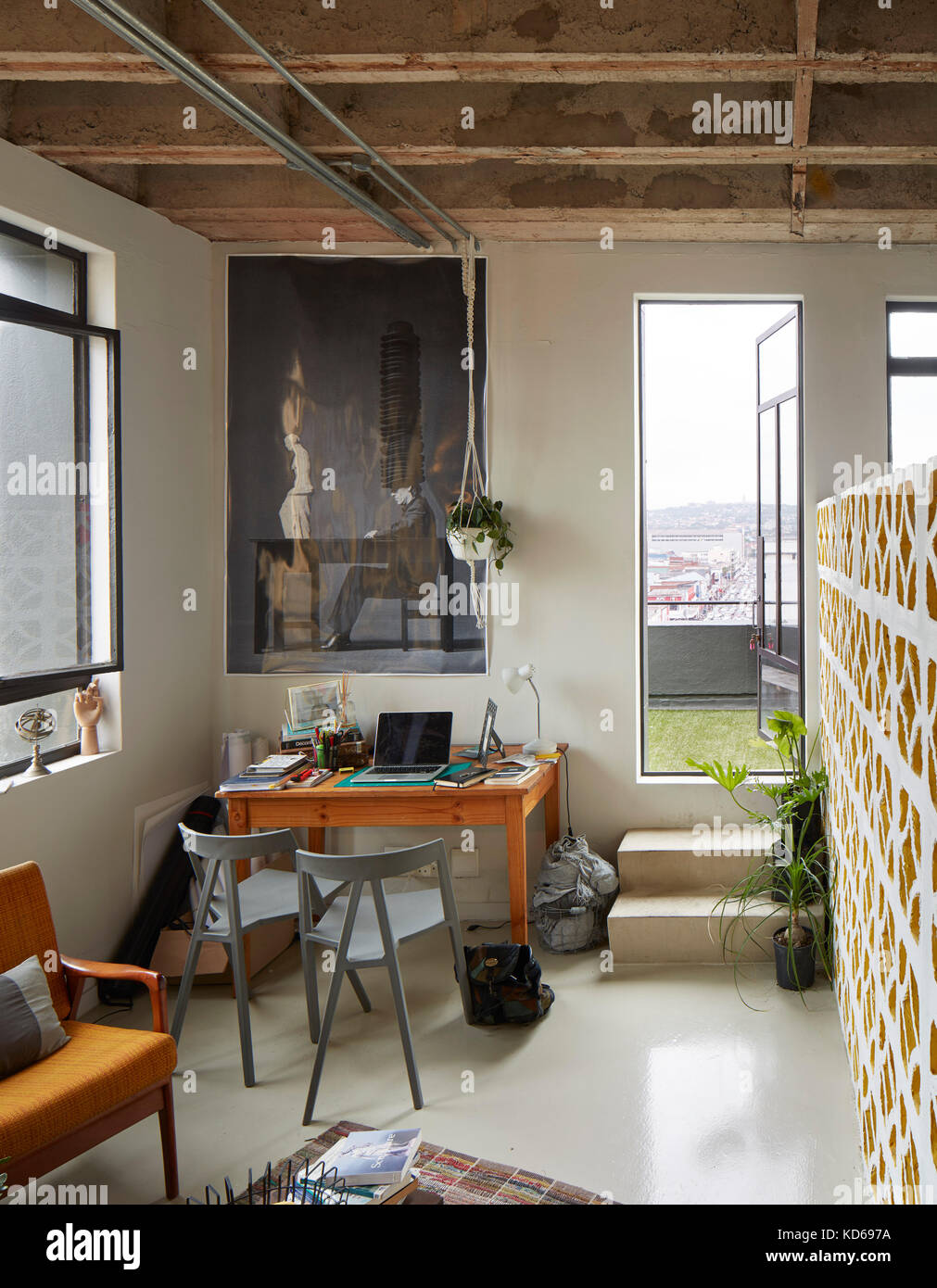 Interior of studio flat with access to balcony. Pixley House, Durban