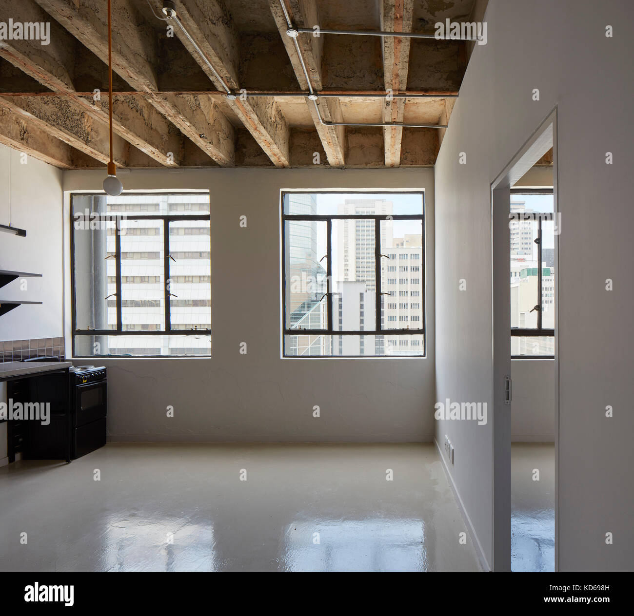 Empty flat interior with city view. Pixley House, Durban, South Africa