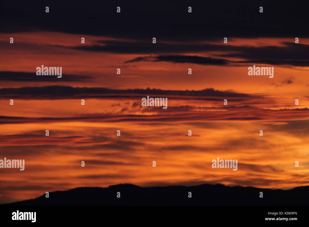 Cloudy colorful sunset sky Stock Photo - Alamy
