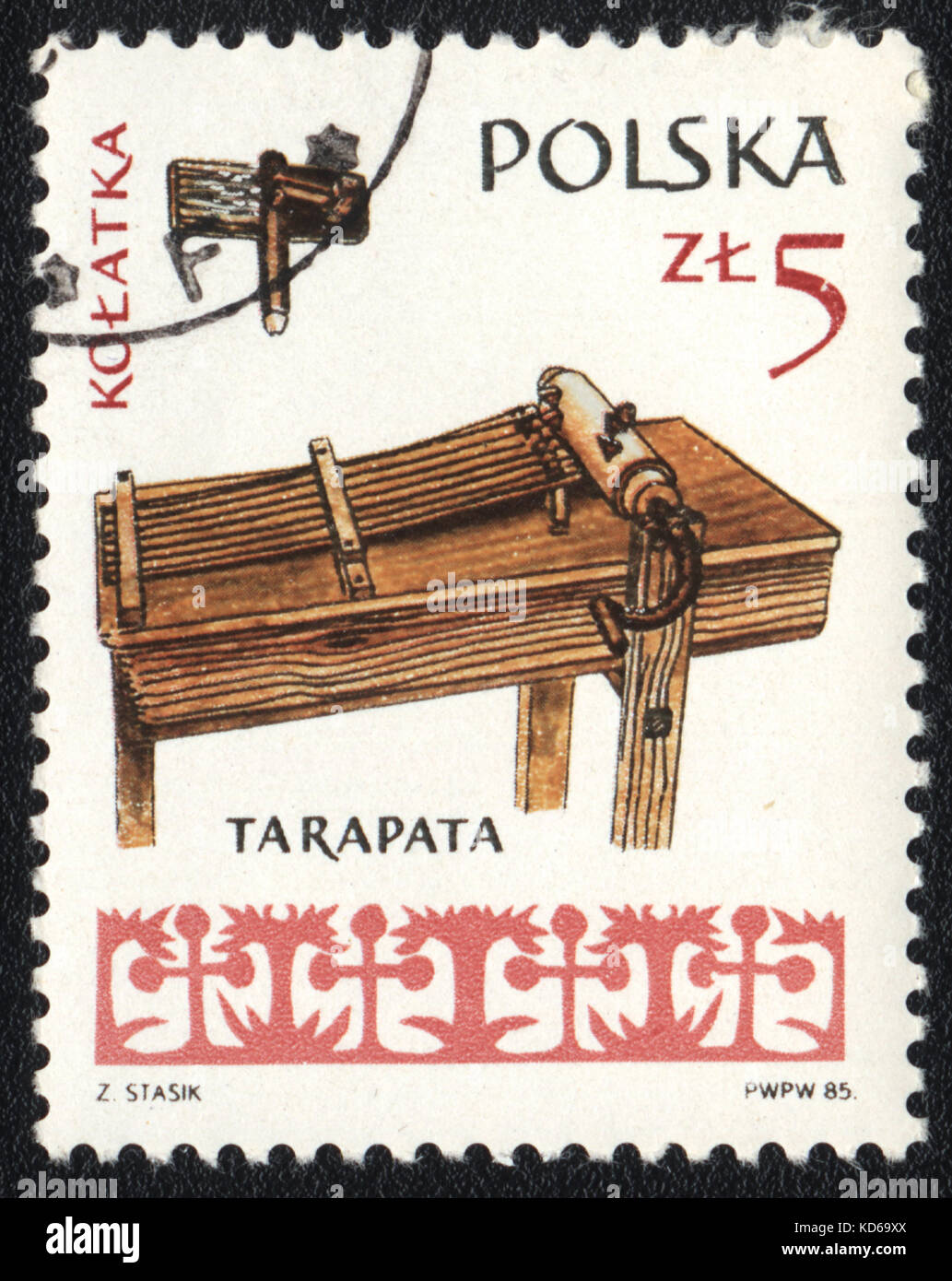 A postage stamp printed in POLAND shows Musical Instruments Door ...